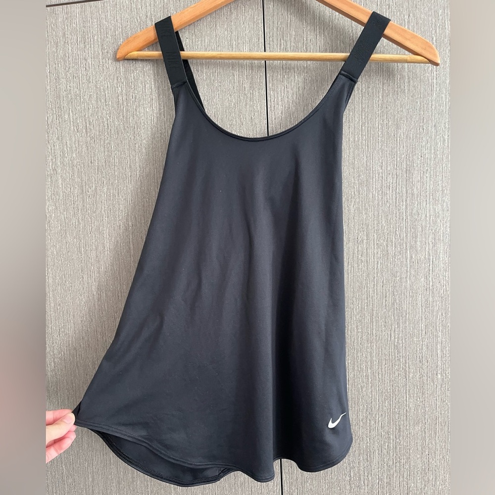 Nike Women's Black Tank Top with elastic straps and crisscross back.